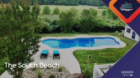San Juan fiberglass pool with bright turquoise water in a backyard