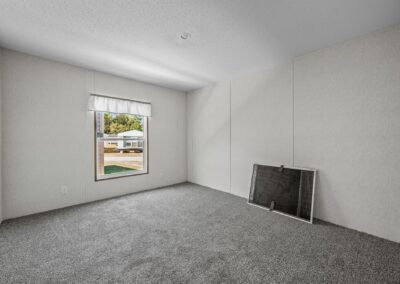Showroom interior with window view of a San Juan fiberglass pool